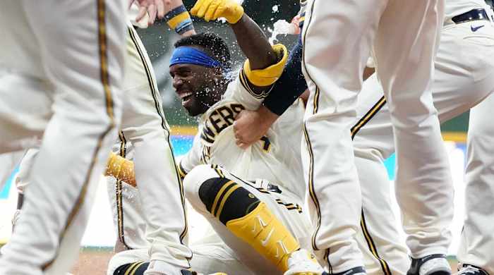 Milwaukee Brewers’ Andrew McCutchen celebrates after hitting a walk-off RBI single during the ninth inning of a baseball game against the San Diego Padres Thursday, June 2, 2022, in Milwaukee. The Brewers won 5-4.